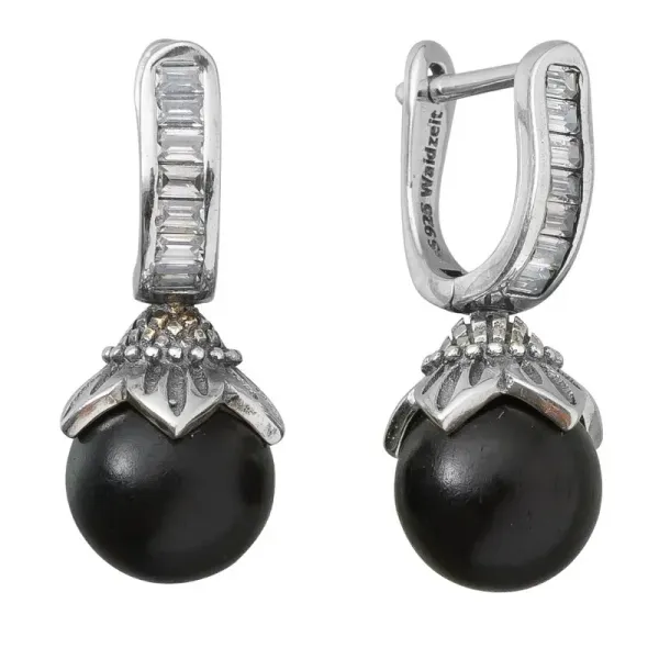 Silver dangle earrings made of ebony wood