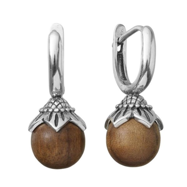 Silver earrings made of walnut wood